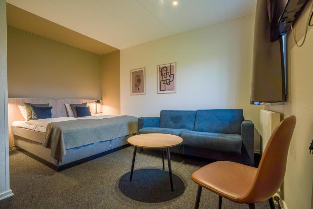 Voodi või voodid majutusasutuse Hotel Hedemarken toas