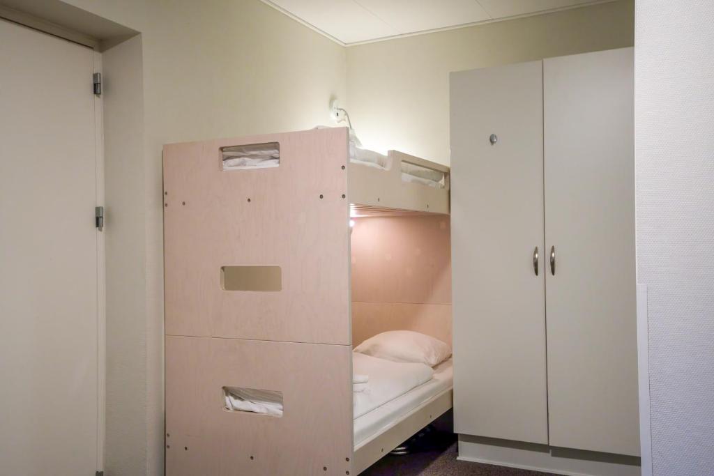 Voodi või voodid majutusasutuse Hotel Hedemarken toas