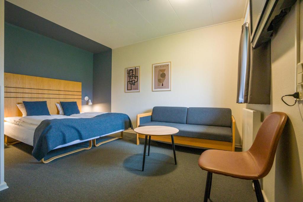 Voodi või voodid majutusasutuse Hotel Hedemarken toas