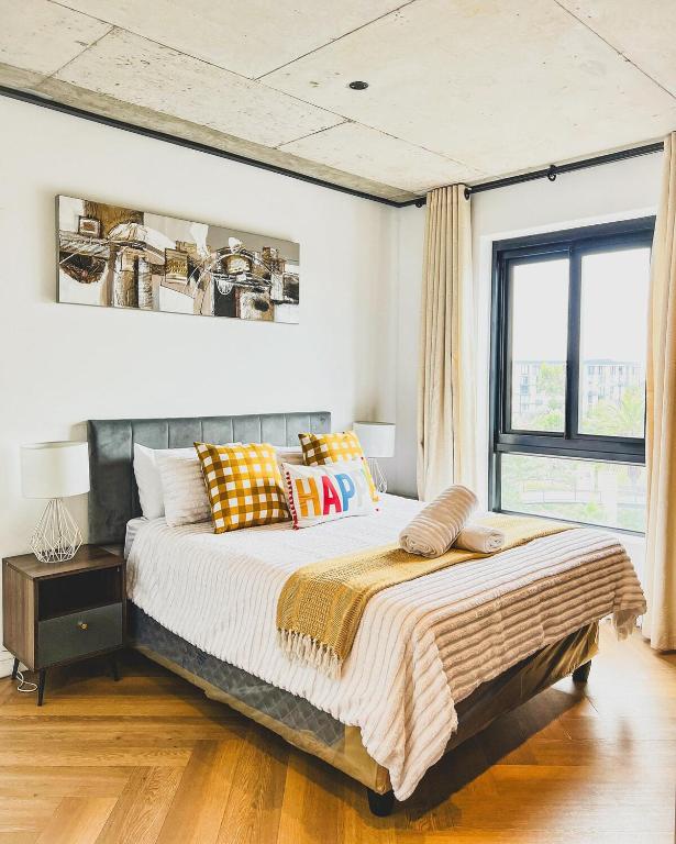 Ένα ή περισσότερα κρεβάτια σε δωμάτιο στο Olive Apartment on Bridgewaters