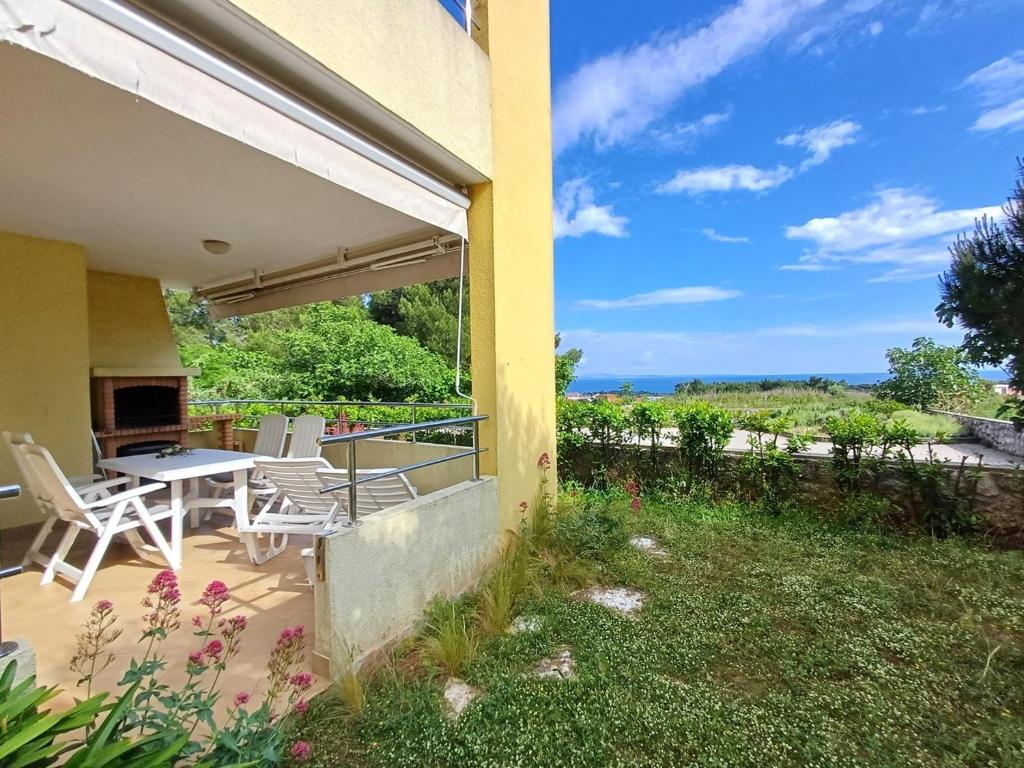 Vonkajšia záhrada v ubytovaní Cozy Apartment Mediterraneo