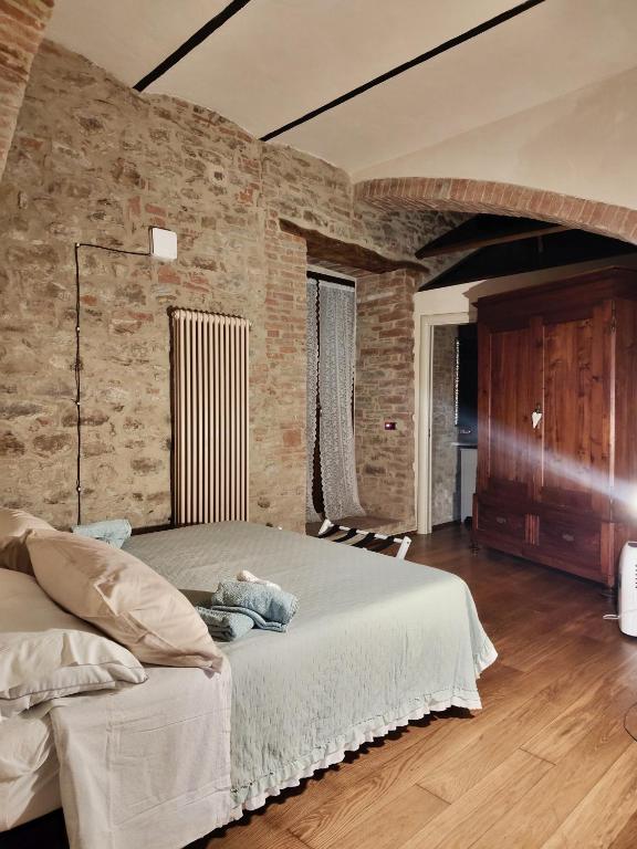 Postel nebo postele na pokoji v ubytování "Il Pollaio" guests house