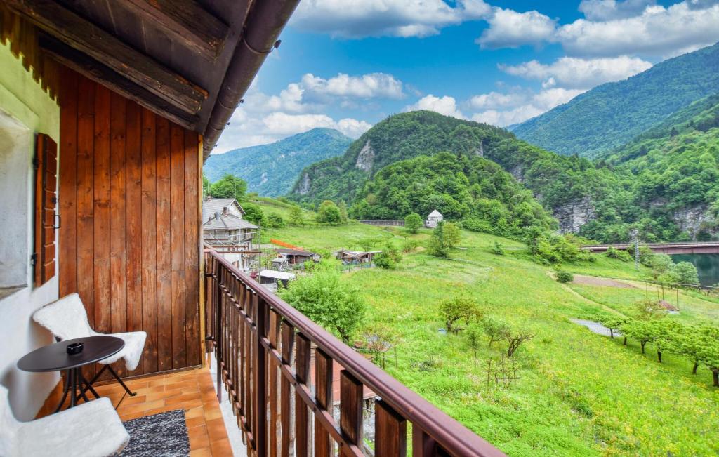a balcony with a view of the mountains at 2 Bedroom Cozy Apartment In Arsiè in Arsiè