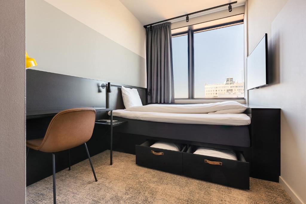 Postel nebo postele na pokoji v ubytování Comfort Hotel Västerås