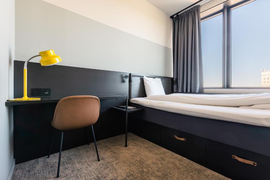 Postel nebo postele na pokoji v ubytování Comfort Hotel Västerås