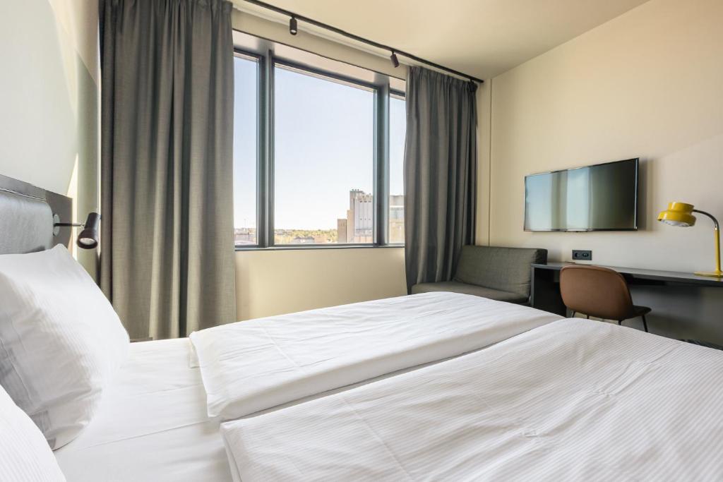 Postel nebo postele na pokoji v ubytování Comfort Hotel Västerås