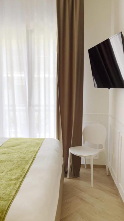 Postel nebo postele na pokoji v ubytování Grillo Suite