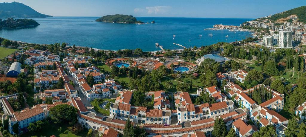 an aerial view of a town next to the water at Hotel Slovenska Plaza in Budva