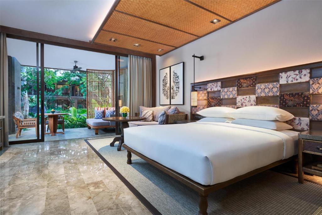 Postel nebo postele na pokoji v ubytování Andaz Bali, By Hyatt