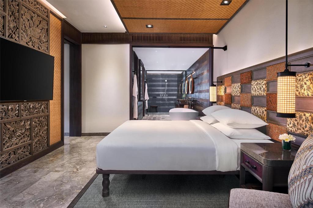 Postel nebo postele na pokoji v ubytování Andaz Bali, By Hyatt