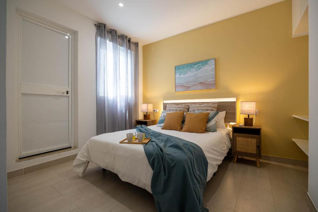 Postel nebo postele na pokoji v ubytování Aire Siroco - Beach Apartment 14