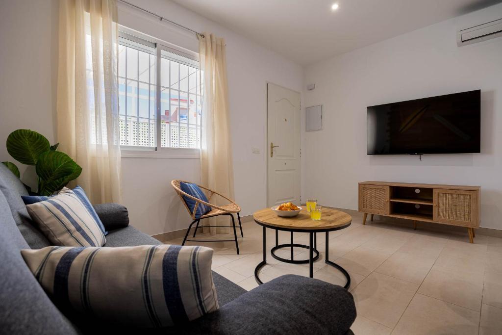 TV a/nebo společenská místnost v ubytování Aire Siroco - Beach Apartment 14