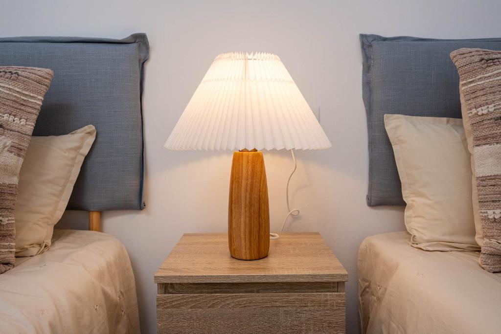 Postel nebo postele na pokoji v ubytování Aire Siroco - Beach Apartment 14