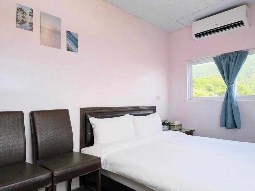 Postel nebo postele na pokoji v ubytování A-Lang Homestay