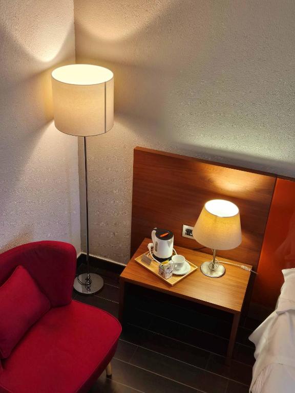 Postel nebo postele na pokoji v ubytování Hotel Sandalia