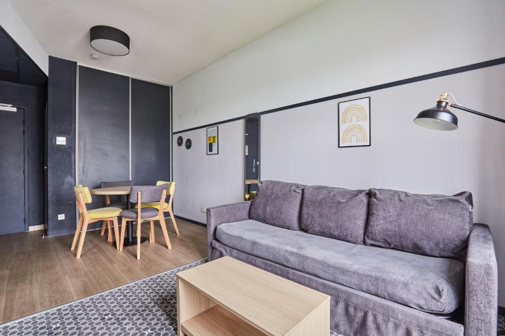 Posezení v ubytování Appart'hôtel Odalys City - Bioparc Lyon Est