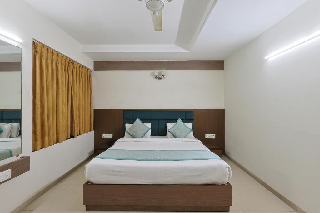 Postel nebo postele na pokoji v ubytování Hotel VENUE INN