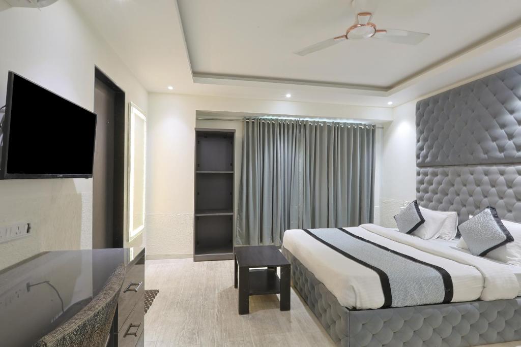 Postel nebo postele na pokoji v ubytování Hotel VENUE INN