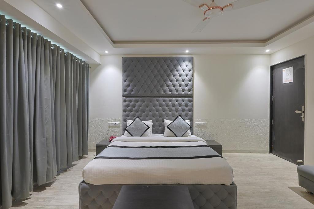 Postel nebo postele na pokoji v ubytování Hotel VENUE INN