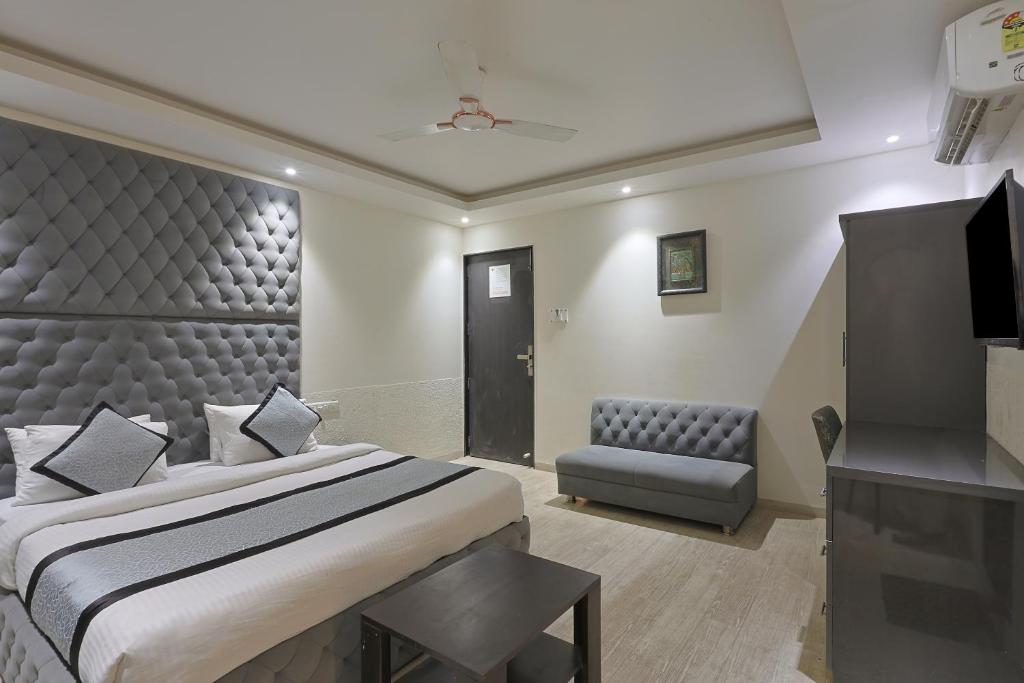 Postel nebo postele na pokoji v ubytování Hotel VENUE INN