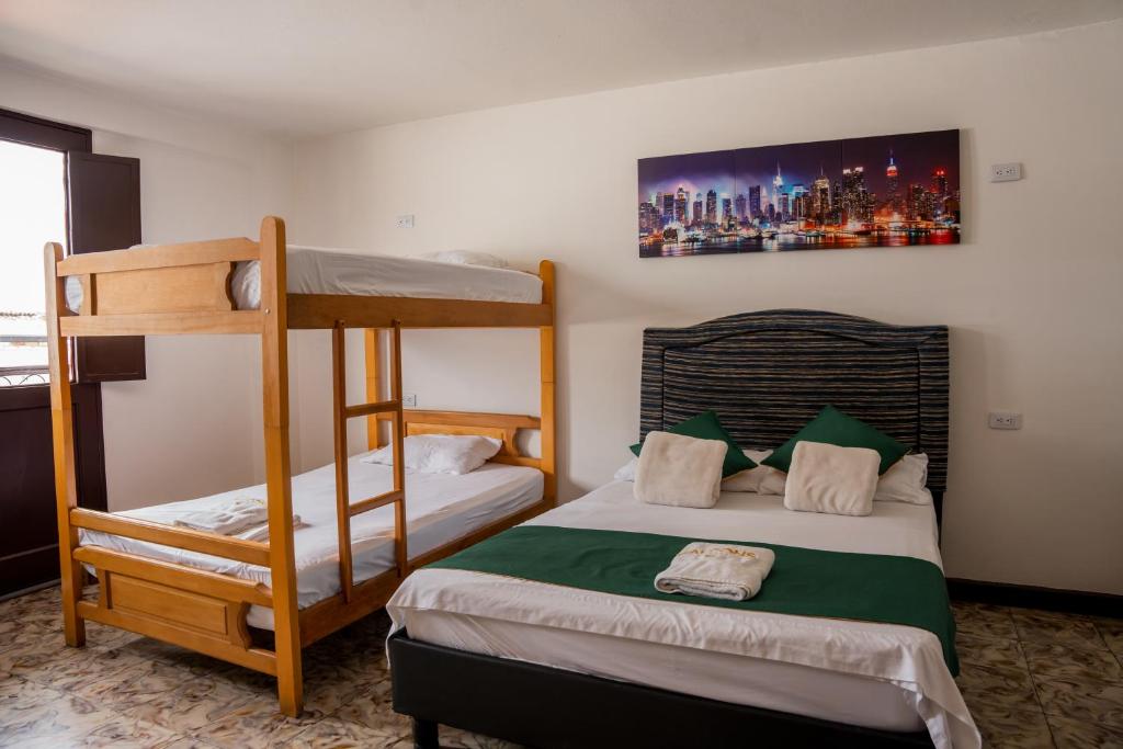 Voodi või voodid majutusasutuse Les Balcons Hostel toas