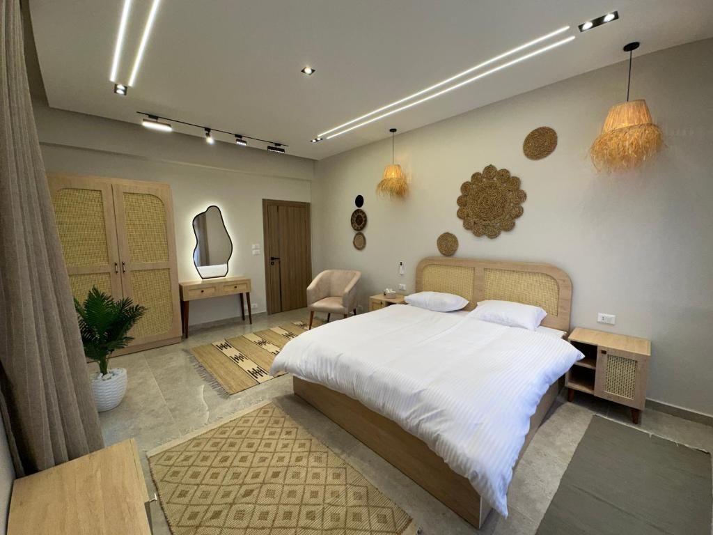 Ένα ή περισσότερα κρεβάτια σε δωμάτιο στο New Cairo Chic Studio 2