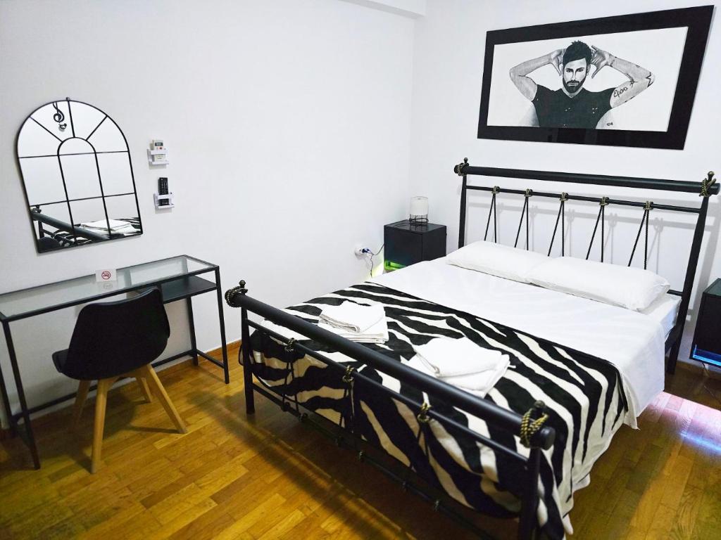 Postel nebo postele na pokoji v ubytování Nicko’s room
