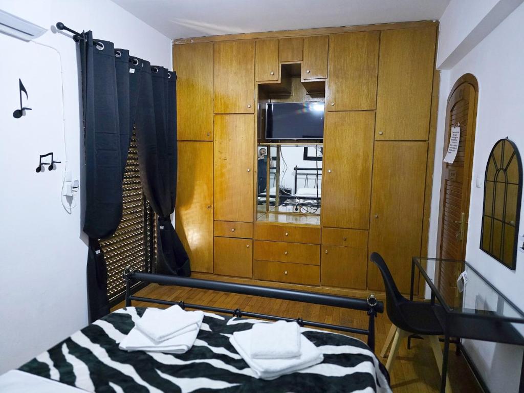 Postel nebo postele na pokoji v ubytování Nicko’s room