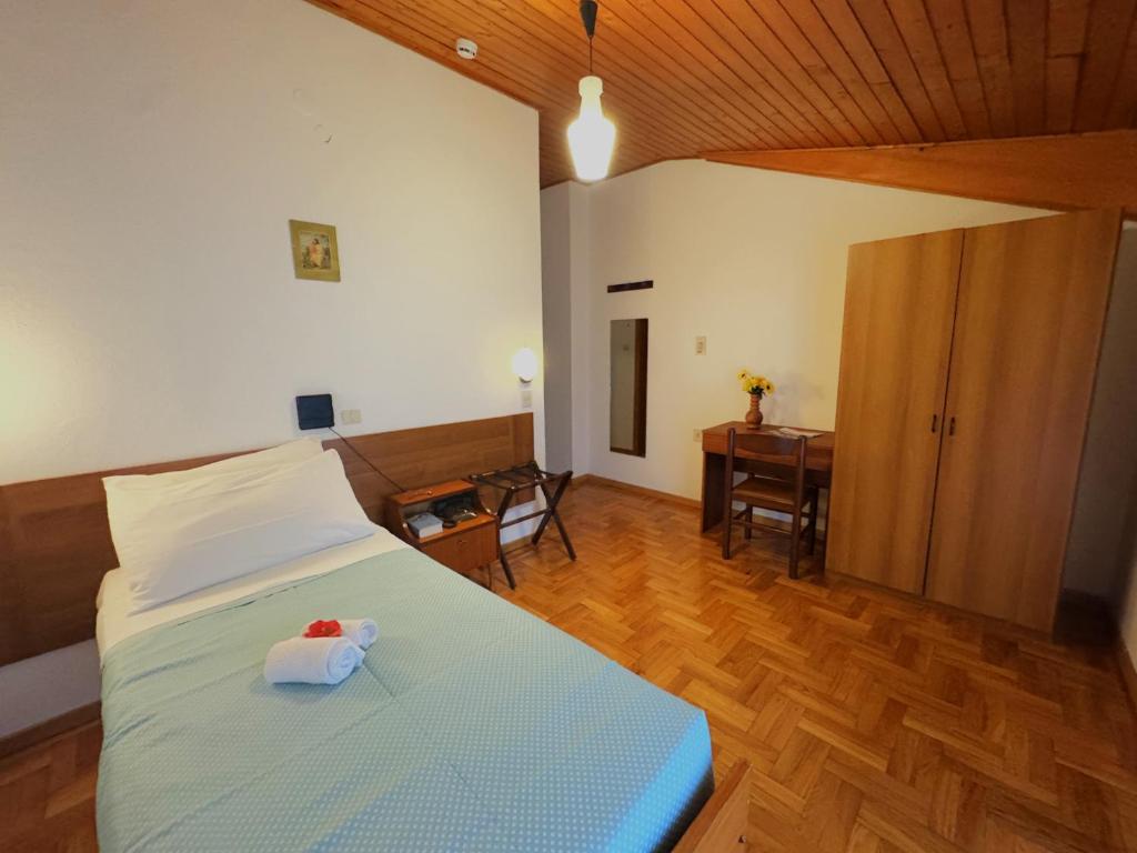 Postel nebo postele na pokoji v ubytování Hotel Excelsior