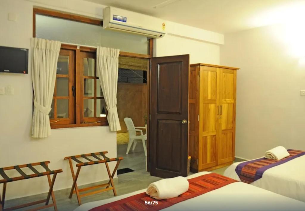 Postel nebo postele na pokoji v ubytování The Villa In Lavinia
