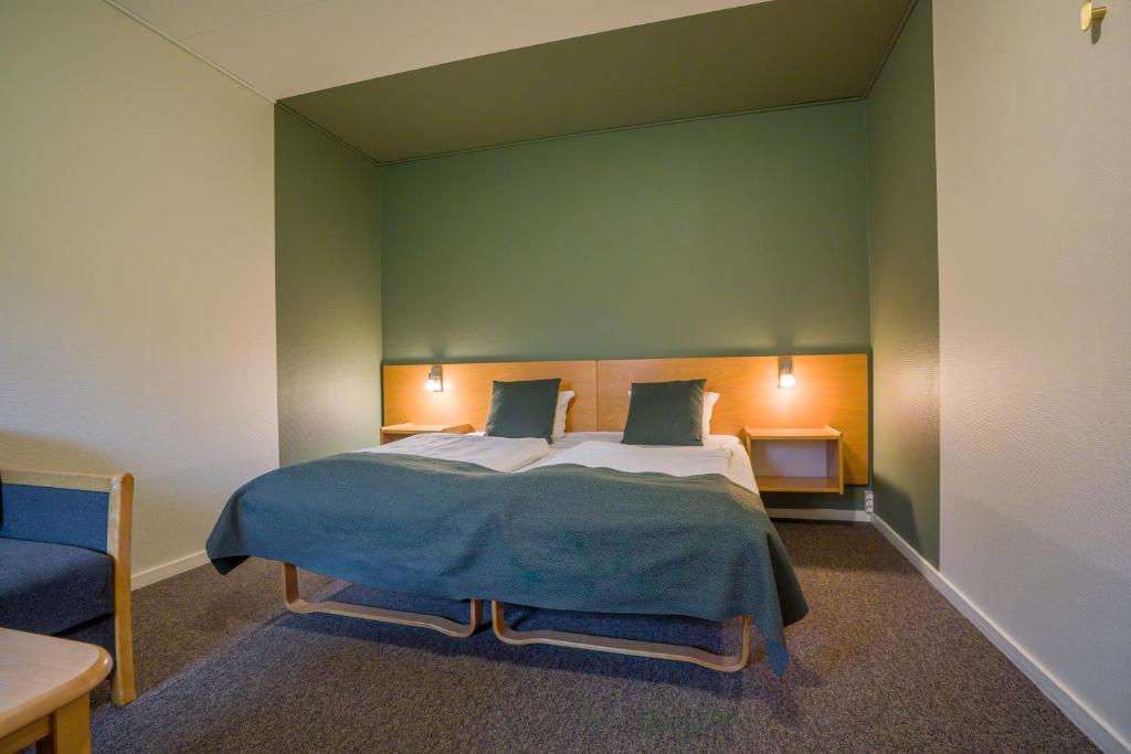Voodi või voodid majutusasutuse Hotel Hedemarken toas
