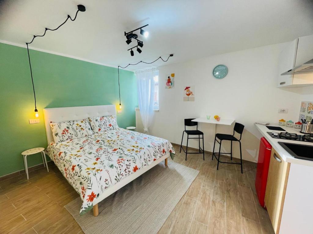 Ένα ή περισσότερα κρεβάτια σε δωμάτιο στο Piccolo Amore