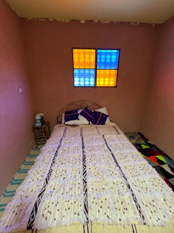Postel nebo postele na pokoji v ubytování Gite Amani Guest House