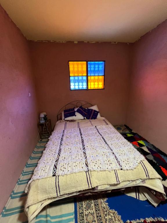 Postel nebo postele na pokoji v ubytování Gite Amani Guest House