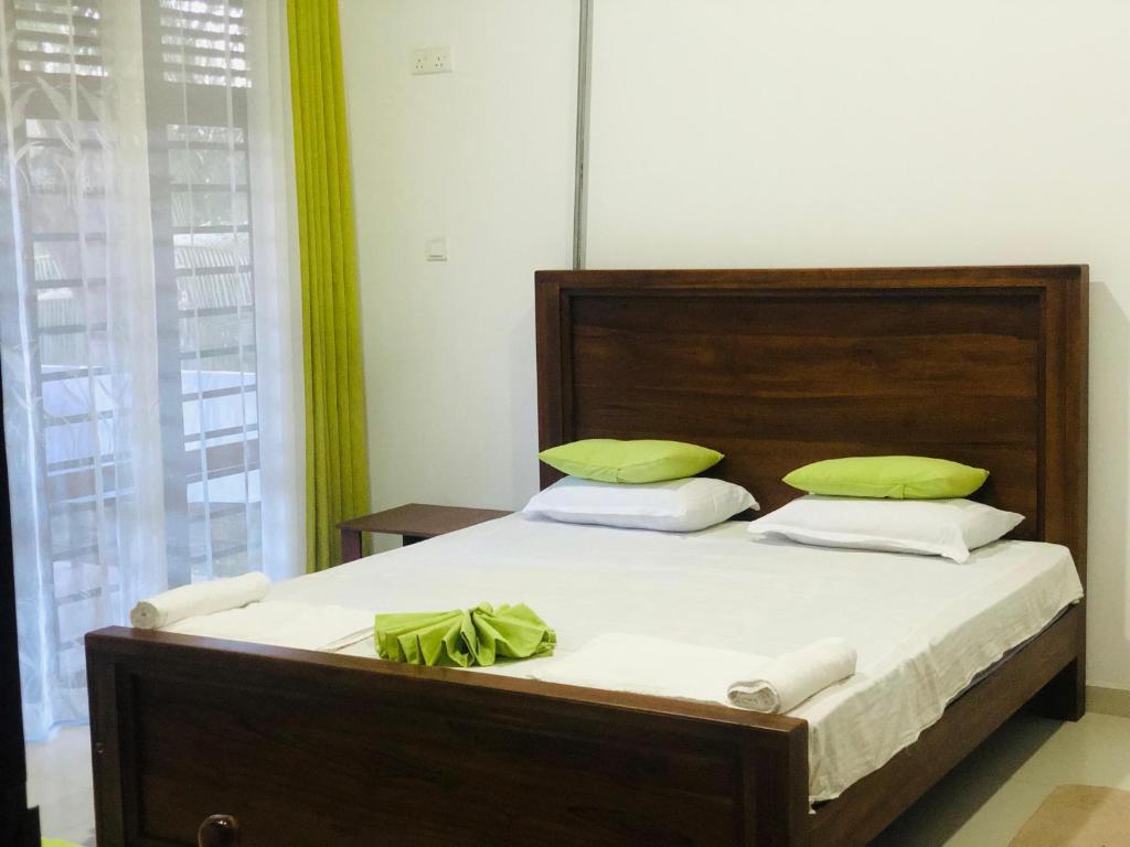 Postel nebo postele na pokoji v ubytování White Square Home-stay