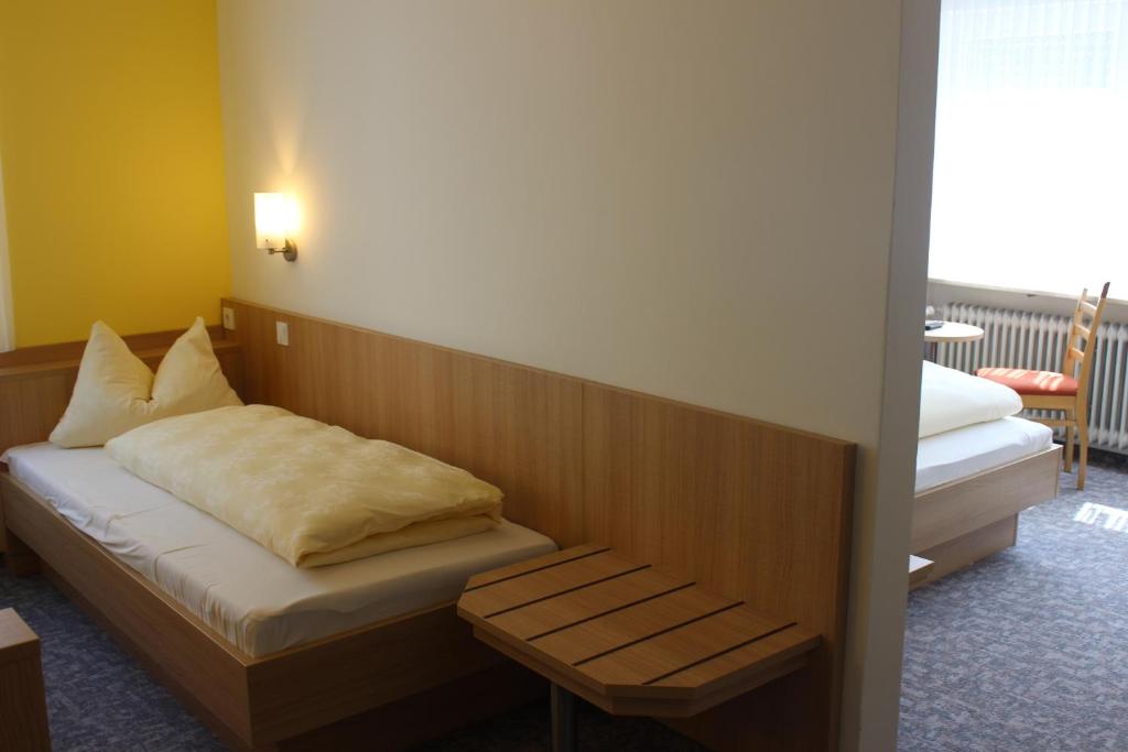 Postel nebo postele na pokoji v ubytování Hotel Gasthof Seehof