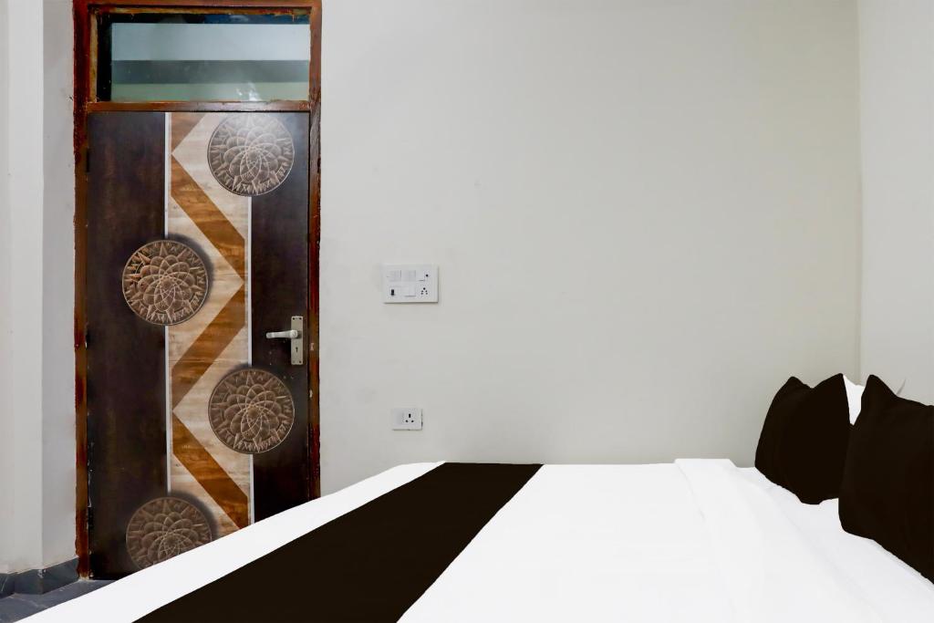 Postel nebo postele na pokoji v ubytování Super Hotel O Kalka