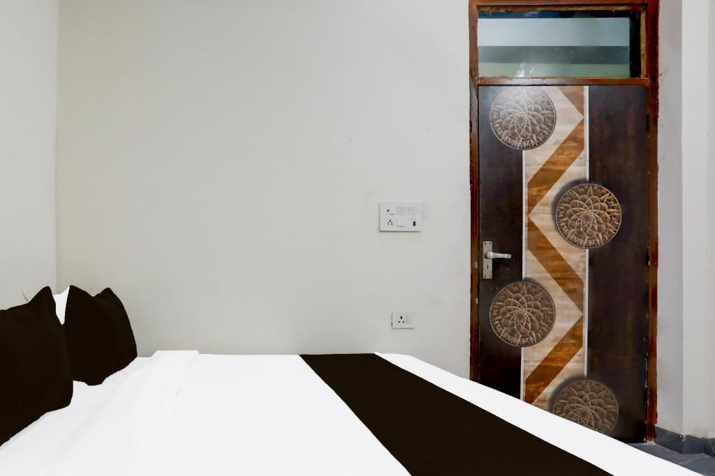 Postel nebo postele na pokoji v ubytování Super Hotel O Kalka