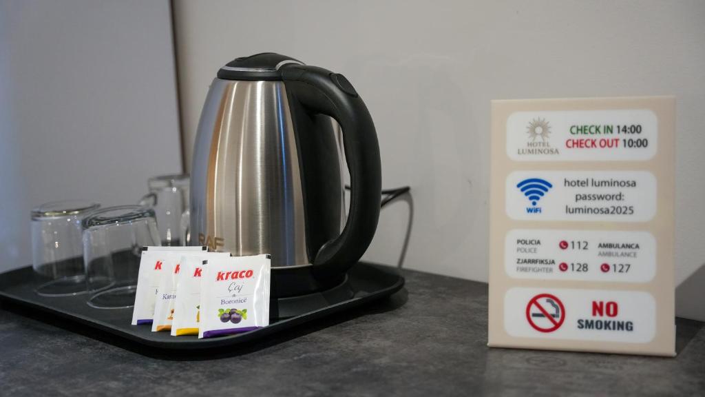 Certifikát, hodnocení, plakát nebo jiný dokument vystavený v ubytování Hotel LUMINOSA