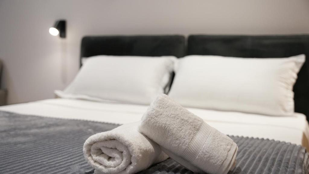 Postel nebo postele na pokoji v ubytování Hotel LUMINOSA