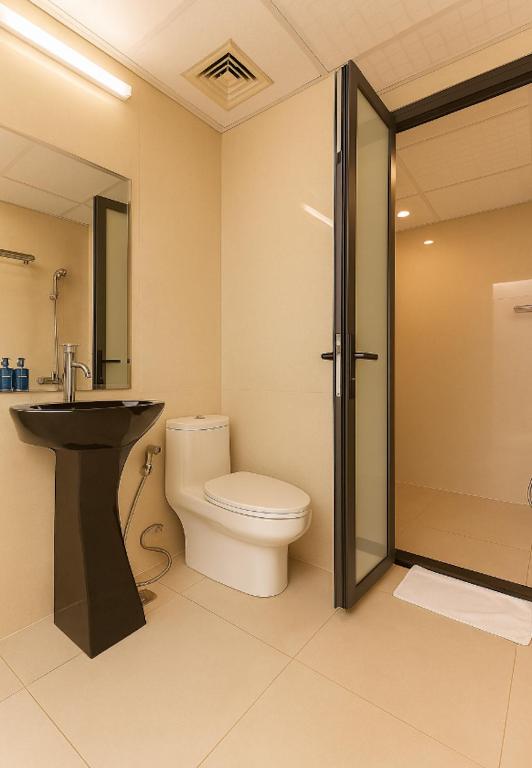 Koupelna v ubytování Mercury Apartment Danang