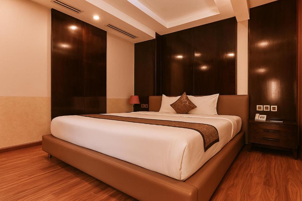 Postel nebo postele na pokoji v ubytování Mercury Apartment Danang