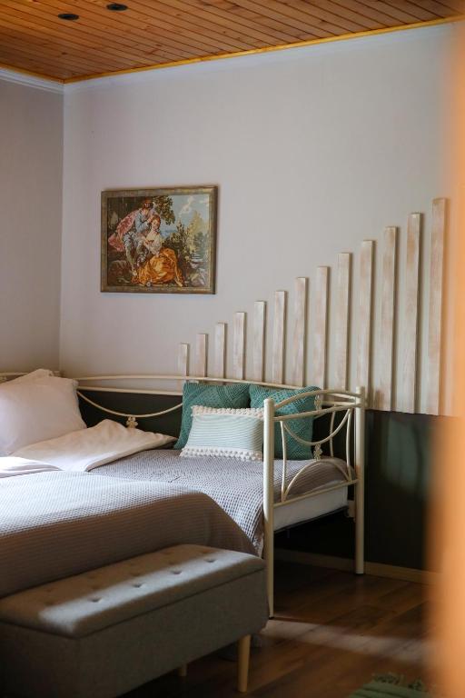 Postel nebo postele na pokoji v ubytování Plis Bujtina - Guesthouse
