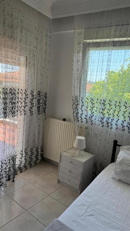 Łóżko lub łóżka w pokoju w obiekcie Pavlina