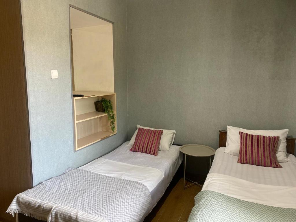 Postel nebo postele na pokoji v ubytování Hotel Prime