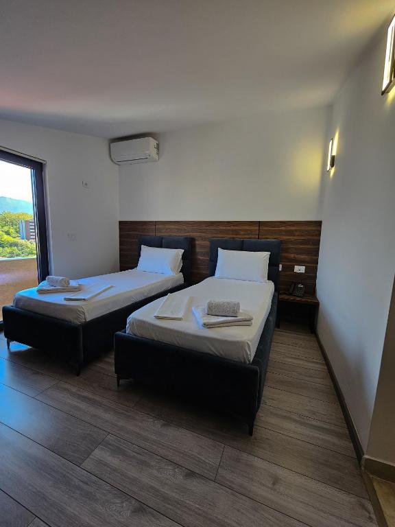 Postel nebo postele na pokoji v ubytování Hotel Agron