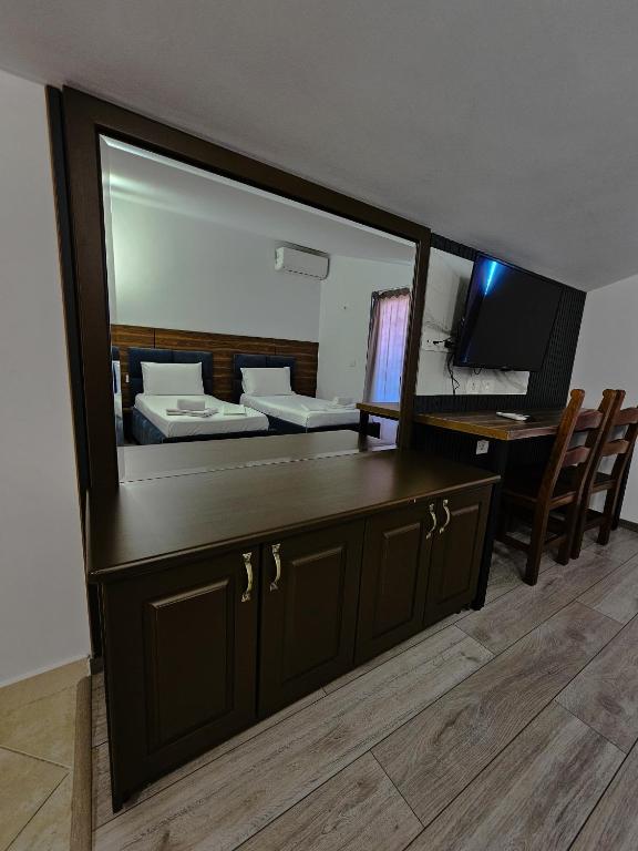 TV a/nebo společenská místnost v ubytování Hotel Agron