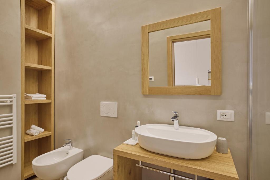 Een badkamer bij Hotel Le Mura