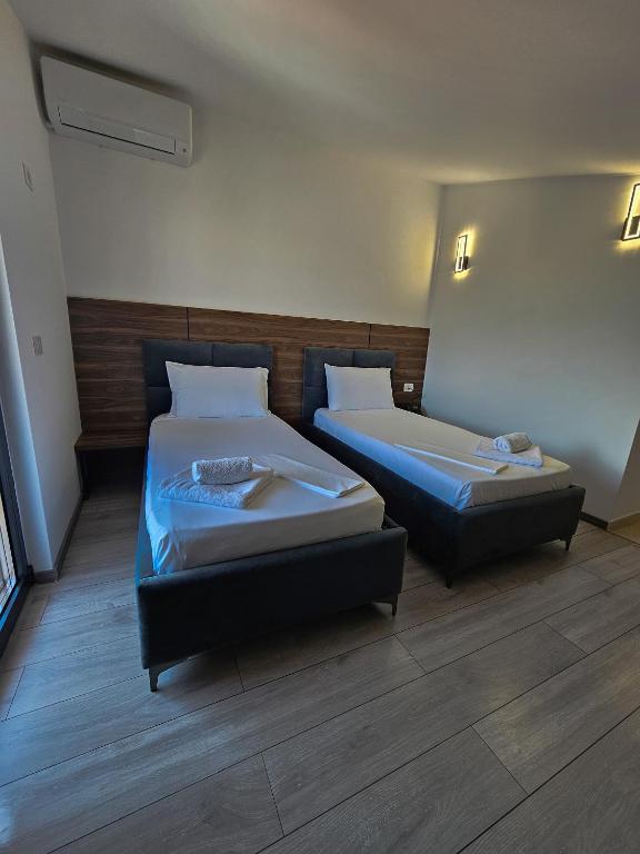 Postel nebo postele na pokoji v ubytování Hotel Agron
