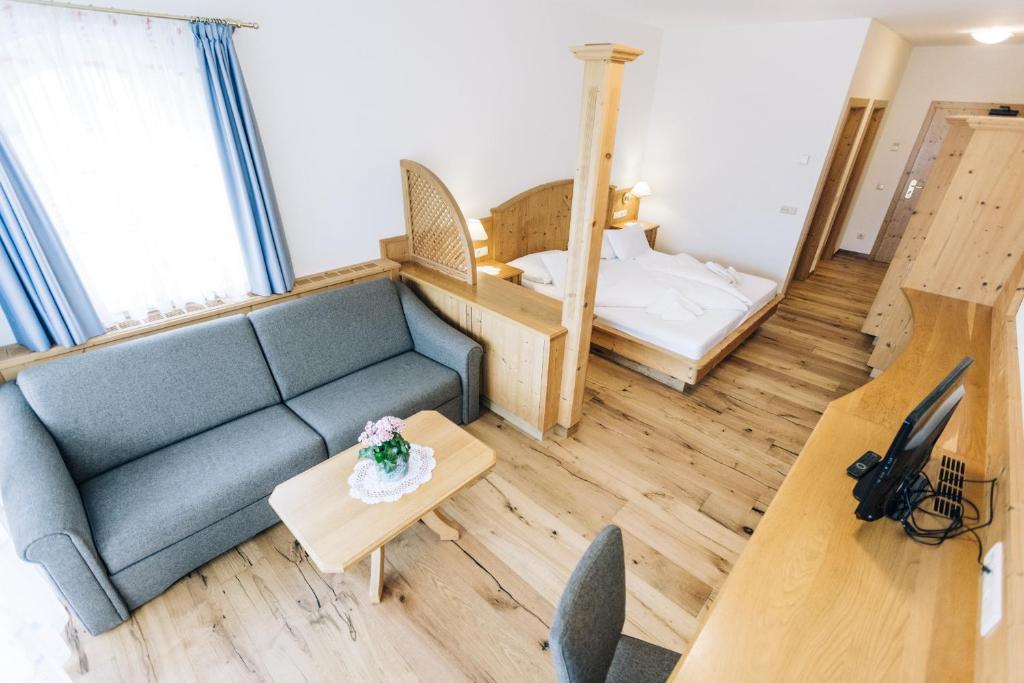 Posteľ alebo postele v izbe v ubytovaní Hotel Tenz